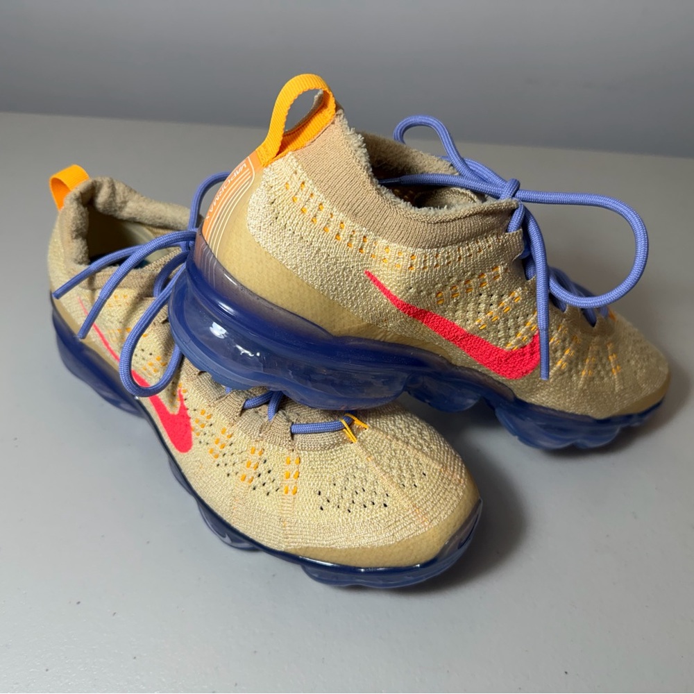 Nike women’s sneaker - Tan and Purple with Orange Accents BRAND NEW!